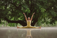Ananda jumpsuit in light yellow - splits pose