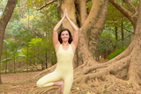Ananda jumpsuit in light yellow - tree pose