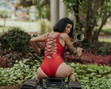 Bodysuit in lighter red - motorcycle pose