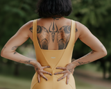 Jumpsuit in butter yellow - back view